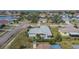 Aerial view of single-Gathering house with sunroom and backyard at 4188 104Th N Ave, Clearwater, FL 33762