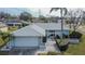 Aerial view of house, driveway, and neighborhood at 4188 104Th N Ave, Clearwater, FL 33762