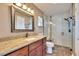 Updated bathroom with granite vanity and walk-in shower at 4188 104Th N Ave, Clearwater, FL 33762