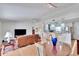 Open concept dining area with a view of the living room and kitchen at 4188 104Th N Ave, Clearwater, FL 33762