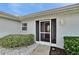 Inviting front entrance with a screened porch at 4188 104Th N Ave, Clearwater, FL 33762