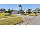 Single-story home with attached garage and driveway at 4188 104Th N Ave, Clearwater, FL 33762