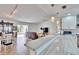 Modern kitchen with white cabinets, granite countertops, and stainless steel appliances at 4188 104Th N Ave, Clearwater, FL 33762