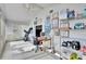 Sunroom with workspace, fitness equipment, and ample storage at 4188 104Th N Ave, Clearwater, FL 33762