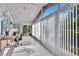 Sunroom features large windows, tiled floor, and plenty of natural light at 4188 104Th N Ave, Clearwater, FL 33762