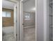 Clean bathroom with tile shower/tub combo, and gray vanity at 4925 Beacon Hill Dr, New Port Richey, FL 34652