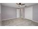 Spacious bedroom with tile floor and double door closet at 4925 Beacon Hill Dr, New Port Richey, FL 34652