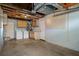 Garage with washer, dryer, and ample storage cabinets at 4925 Beacon Hill Dr, New Port Richey, FL 34652