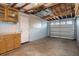 Garage with overhead door and extra storage space at 4925 Beacon Hill Dr, New Port Richey, FL 34652