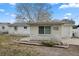 Side view of the house showing a shed at 4925 Beacon Hill Dr, New Port Richey, FL 34652