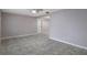 Spacious living room with tiled floors and ceiling fan at 4925 Beacon Hill Dr, New Port Richey, FL 34652