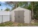 Tan plastic storage shed in backyard at 4925 Beacon Hill Dr, New Port Richey, FL 34652