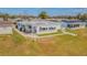 House and backyard next to canal at 5040 Victoria Ln, Holiday, FL 34690