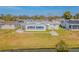 Aerial view of single-story home with water access at 5040 Victoria Ln, Holiday, FL 34690