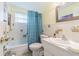 Clean bathroom with shower/tub combo and updated vanity at 5040 Victoria Ln, Holiday, FL 34690