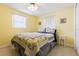 Bright bedroom with double bed and window coverings at 5040 Victoria Ln, Holiday, FL 34690