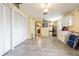 Garage with storage cabinets and tiled floor at 5040 Victoria Ln, Holiday, FL 34690