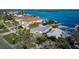 Aerial view of a waterfront home with a private dock at 6323 Bayou Grande Ne Blvd, St Petersburg, FL 33702