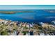 Wide aerial showcasing waterfront property and neighborhood at 6323 Bayou Grande Ne Blvd, St Petersburg, FL 33702