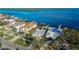 Aerial view of waterfront home with private dock and pool at 6323 Bayou Grande Ne Blvd, St Petersburg, FL 33702