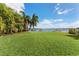 Waterfront property with expansive green lawn at 6323 Bayou Grande Ne Blvd, St Petersburg, FL 33702