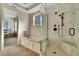 Elegant bathroom with marble shower, soaking tub, and modern fixtures at 6323 Bayou Grande Ne Blvd, St Petersburg, FL 33702