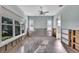 Bedroom with water view and wood flooring at 6323 Bayou Grande Ne Blvd, St Petersburg, FL 33702