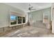 Bedroom with water view and wood flooring at 6323 Bayou Grande Ne Blvd, St Petersburg, FL 33702