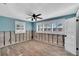 Under construction bedroom with wood flooring and window shutters at 6323 Bayou Grande Ne Blvd, St Petersburg, FL 33702