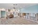 Bright dining area with hardwood floors and a chandelier at 6323 Bayou Grande Ne Blvd, St Petersburg, FL 33702