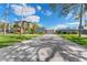 Exterior view of a charming house with a paved driveway at 6323 Bayou Grande Ne Blvd, St Petersburg, FL 33702