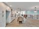 Renovated kitchen with white cabinets, marble countertops, and stainless steel appliances at 6323 Bayou Grande Ne Blvd, St Petersburg, FL 33702
