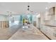 Open floor plan with kitchen, living area, and water views at 6323 Bayou Grande Ne Blvd, St Petersburg, FL 33702