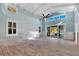 Spacious living room with vaulted ceilings and hardwood floors at 6323 Bayou Grande Ne Blvd, St Petersburg, FL 33702