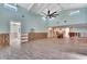 Spacious living room with high ceilings and a ceiling fan at 6323 Bayou Grande Ne Blvd, St Petersburg, FL 33702