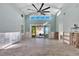 Bright living room with vaulted ceilings and sliding glass doors to patio at 6323 Bayou Grande Ne Blvd, St Petersburg, FL 33702