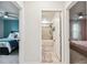 Clean bathroom with tile shower and tub at 6684 Devlin Ln, Wesley Chapel, FL 33545