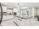 Modern kitchen with stainless steel appliances and granite countertops at 6684 Devlin Ln, Wesley Chapel, FL 33545