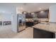 Modern kitchen with stainless steel appliances and granite countertops at 682 Olive Conch St, Ruskin, FL 33570