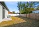 Backyard view with wooden fence at 703 E Wood St, Tampa, FL 33604