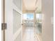 Bathroom with glass-enclosed shower and balcony view at 855 Bayway Blvd # 804, Clearwater Beach, FL 33767