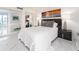 Spacious bedroom with mirrored closet doors and ocean artwork at 855 Bayway Blvd # 804, Clearwater Beach, FL 33767
