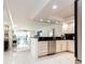 Modern kitchen featuring stainless steel appliances and marble flooring at 855 Bayway Blvd # 804, Clearwater Beach, FL 33767