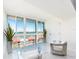 Spacious living area with floor-to-ceiling windows offering scenic water views at 855 Bayway Blvd # 804, Clearwater Beach, FL 33767