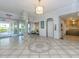 Elegant lobby with tiled floors, seating area, and elevator access at 855 Bayway Blvd # 804, Clearwater Beach, FL 33767