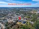 Aerial view of two modern homes near Lake Seminole on Florida's Gulf Coast at 9401 93Rd St, Seminole, FL 33777