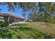 Large backyard with grassy area and partial shade at 1006 Mcdaniel St # 21, Sun City Center, FL 33573