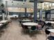 Spacious banquet room with numerous tables and chairs at 1006 Mcdaniel St # 21, Sun City Center, FL 33573