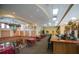 Community clubhouse bar area with tables and seating at 1006 Mcdaniel St # 21, Sun City Center, FL 33573
