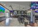 Large community bar with multiple TV screens at 1006 Mcdaniel St # 21, Sun City Center, FL 33573